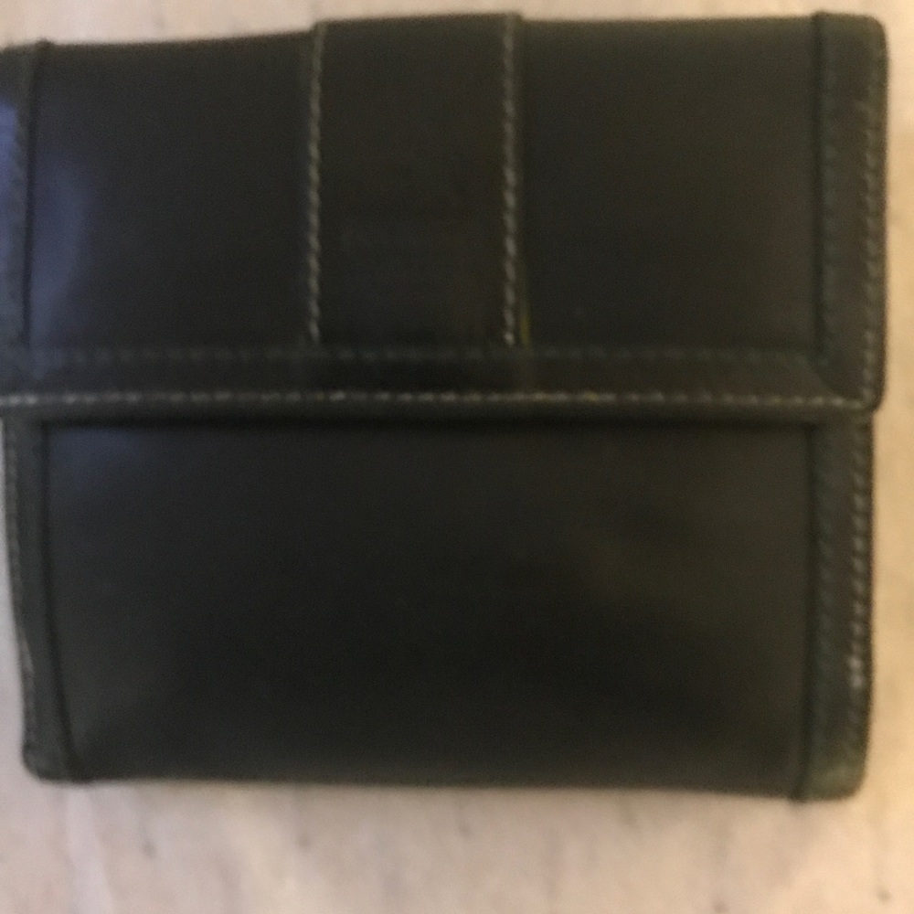 Coach leather wallet..length 4"inches/W 5" inches